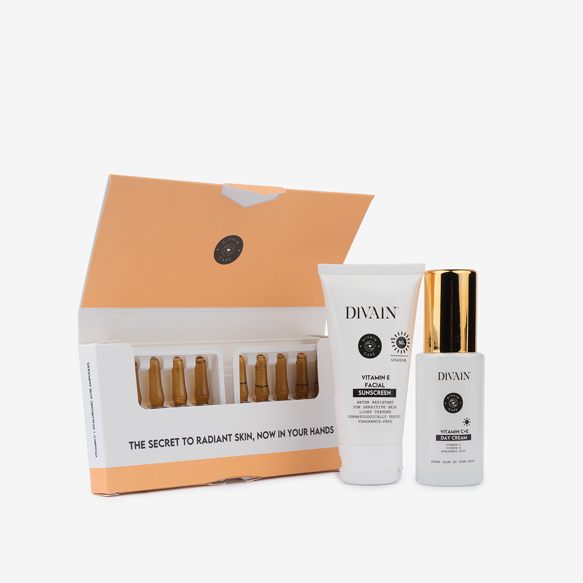 Pack de traitement anti-taches contenant des ampoules pour le visage, une crème hydratante et un écran solaire pour le visage.